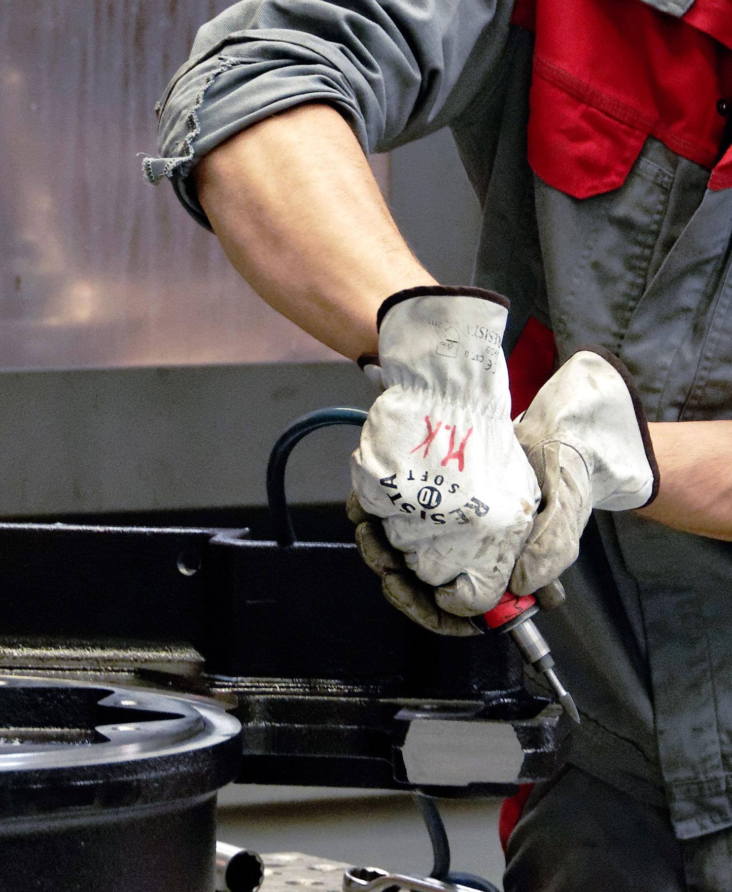 Worker using a pneumatic tool